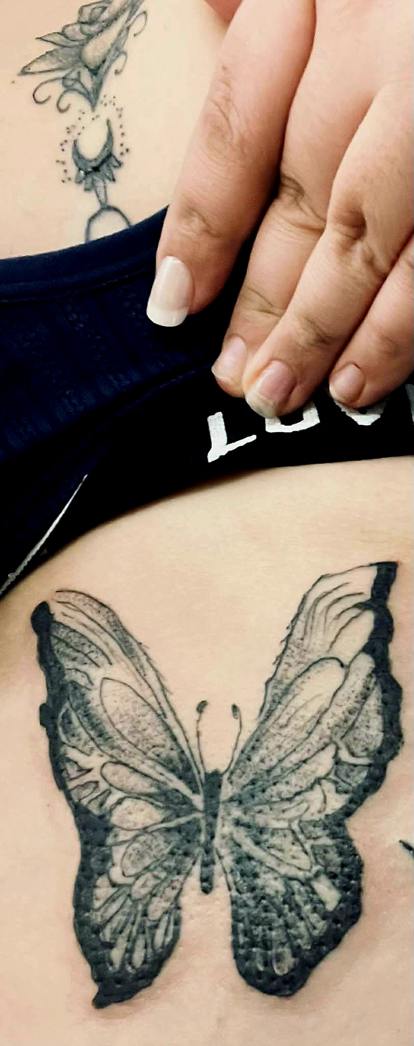 Butterfly tattoo close-up